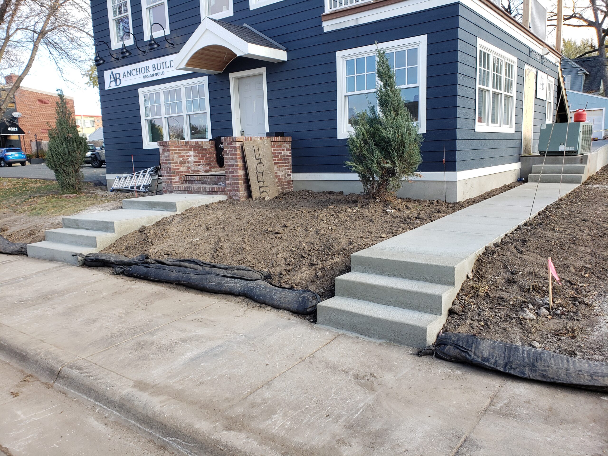 Custom sidewalk and curb pouring services for the Twin Cities metro area from Voehl Construction Inc.