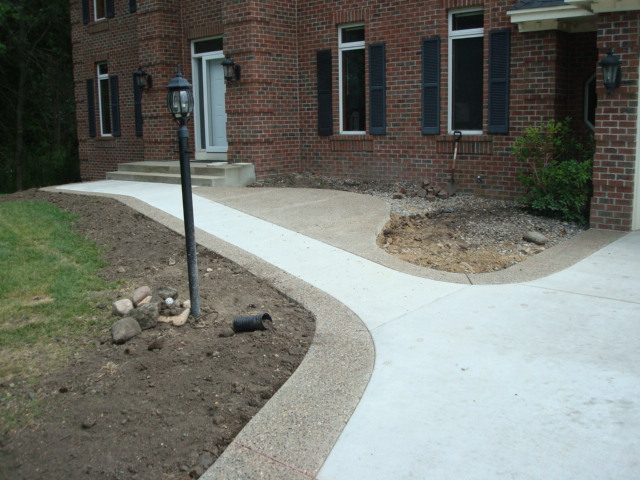 Sidewalk and pathways pouring and finishing for commercial and residential properties and applications in the Twin Cities metro area from Voehl Construction Inc.