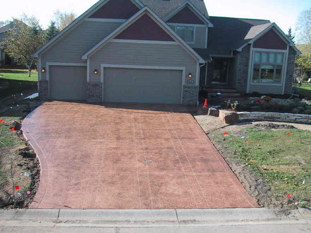 Concrete driveway, sidewalk and flatwork stamping, coloring, and custom finishing services for residential and commercial applications in the Twin Cities metro area from Voehl Construction Inc.